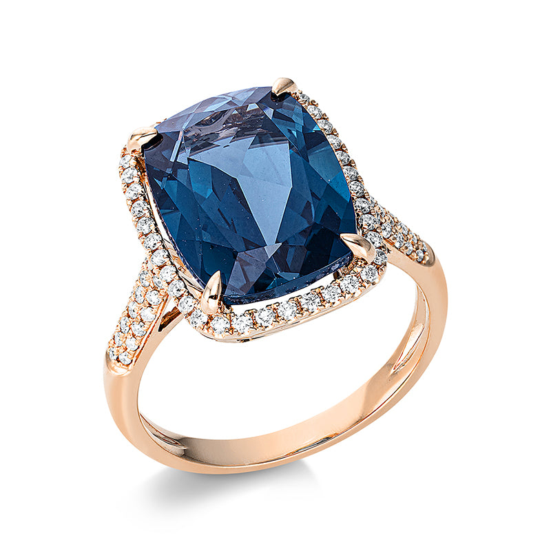 Ring 18 kt RG, 76 Brill. 0,38 ct, TW-si, 1 Topas 8,80 ct Lond. blue