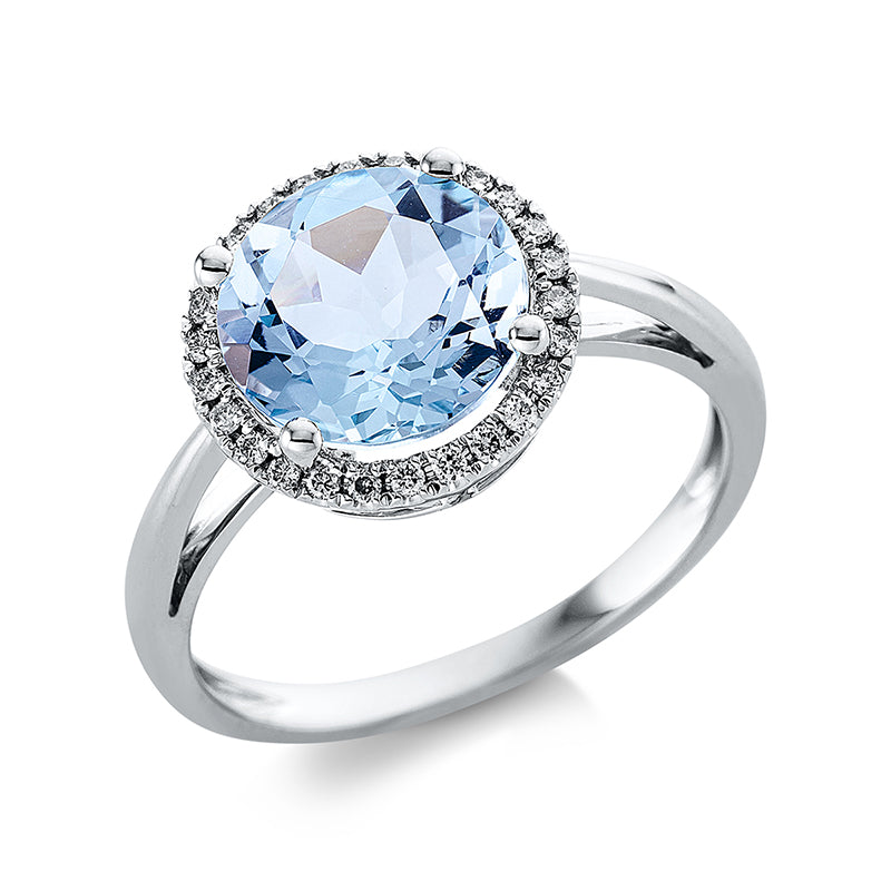 Ring 18 kt WG, 26 Brill. 0,14 ct, TW-si, 1 Topas 3,10 ct sky blue