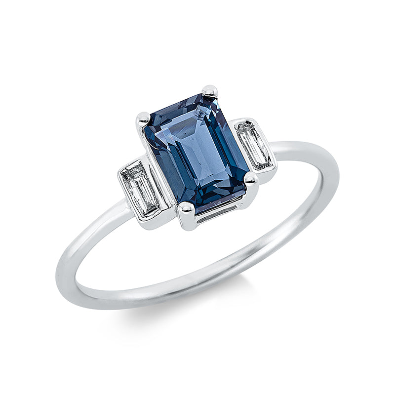 Ring 18 kt WG, 2 Bag. 0,09 ct, TW-si, 1 Topas 1,15 ct Lond. blue