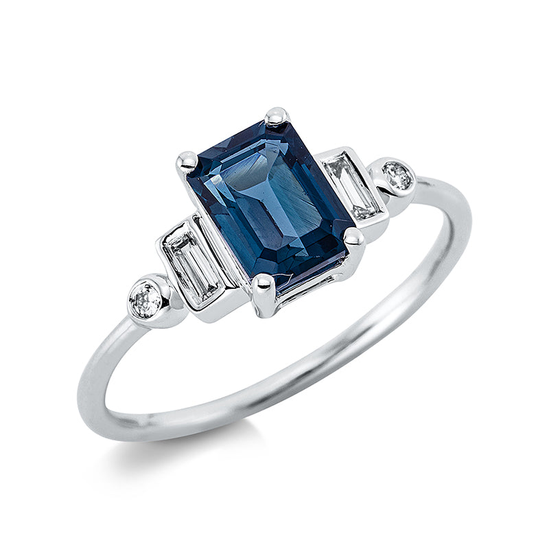Ring 18 kt WG, 2 Bag. 0,09 ct, TW-si, 2 Brill. 0,03 ct, TW-si, 1 Topas 1,15 ct Lond. blue
