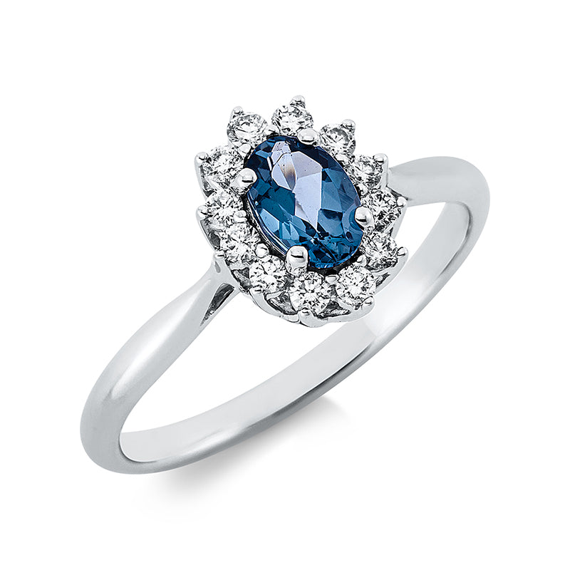 Ring 18 kt WG, 6 Brill. 0,11 ct, TW-si, 6 Brill. 0,09 ct, TW-si, 1 Topas 0,58 ct Lond. blue