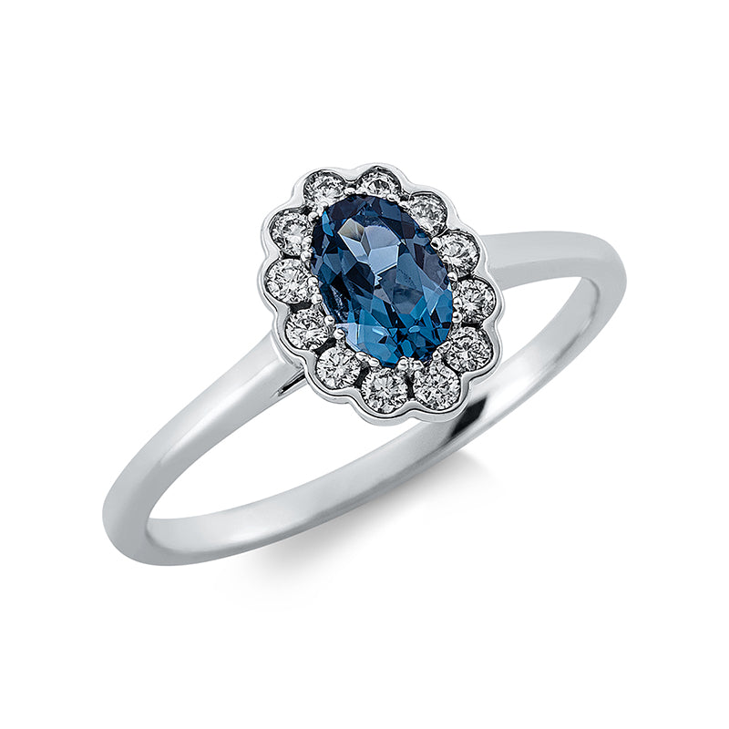 Ring 18 kt WG, 12 Brill. 0,15 ct, TW-si, 1 Topas 0,58 ct Lond. blue