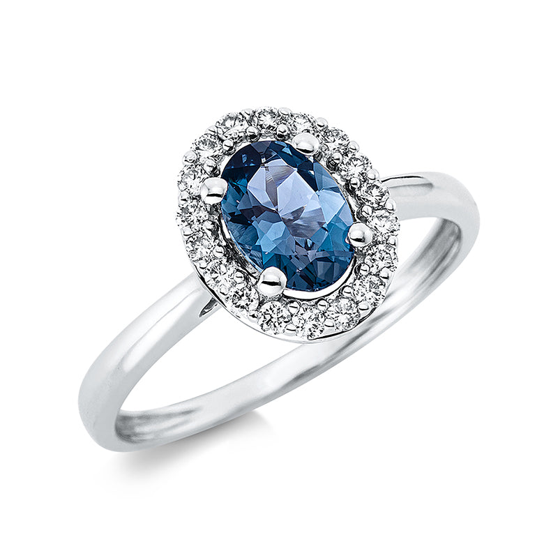 Ring 18 kt WG, 8 Brill. 0,08 ct, TW-si, 10 Brill. 0,12 ct, TW-si, 1 Topas 0,90 ct Lond. blue
