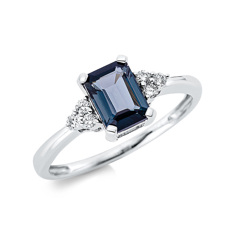 Ring 18 kt WG, 6 Brill. 0,09 ct, TW-si, 1 Topas 0,90 ct Lond. blue