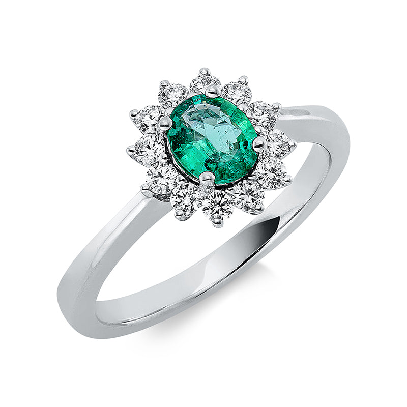 Ring 18 kt WG, 12 Brill. 0,32 ct, F-vsi/si, 1 Smaragd 0,59 ct grün