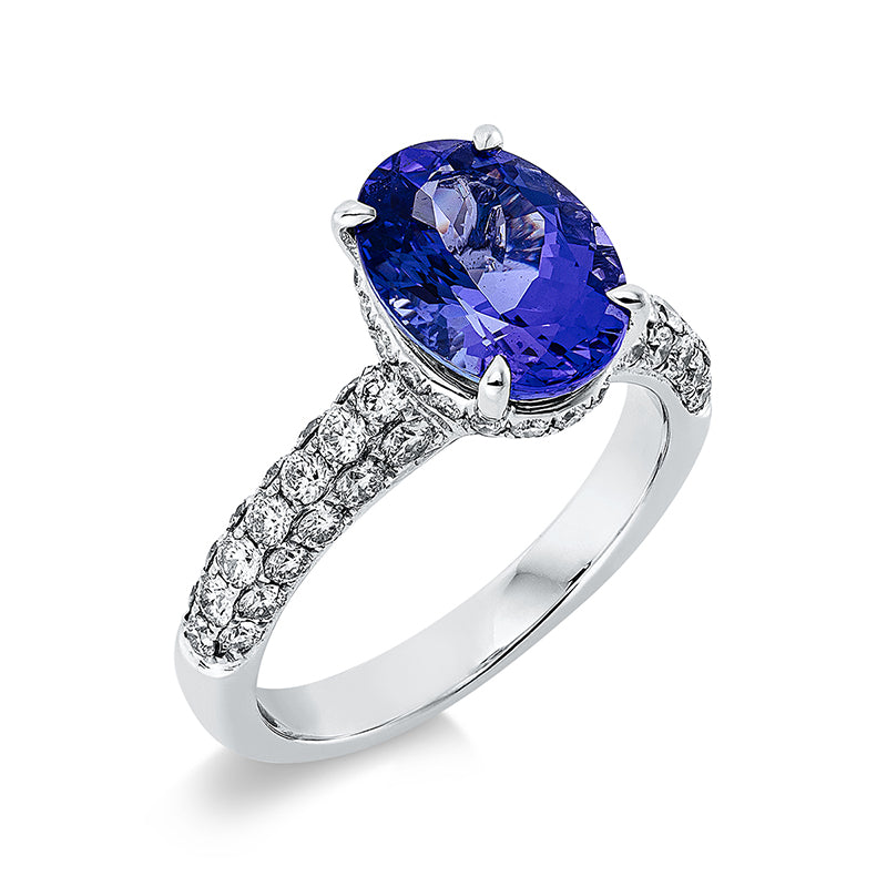 Ring 18 kt WG, 56 Brill. 0,94 ct, TW-si, 1 Tansanit 3,45 ct blau