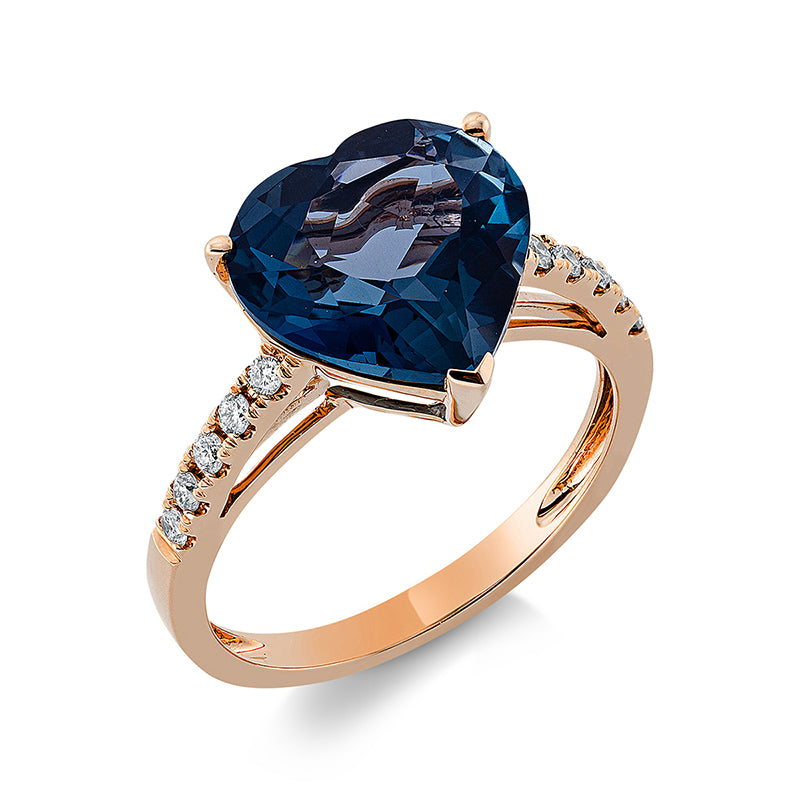 Ring 18 kt RG, 10 Brill. 0,21 ct, TW-si, 1 Topas 5,40 ct Lond. blue