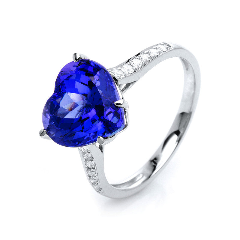 Ring 14 kt WG, 12 Brill. 0,20 ct, TW-si, 1 Tansanit 3,91 ct blau