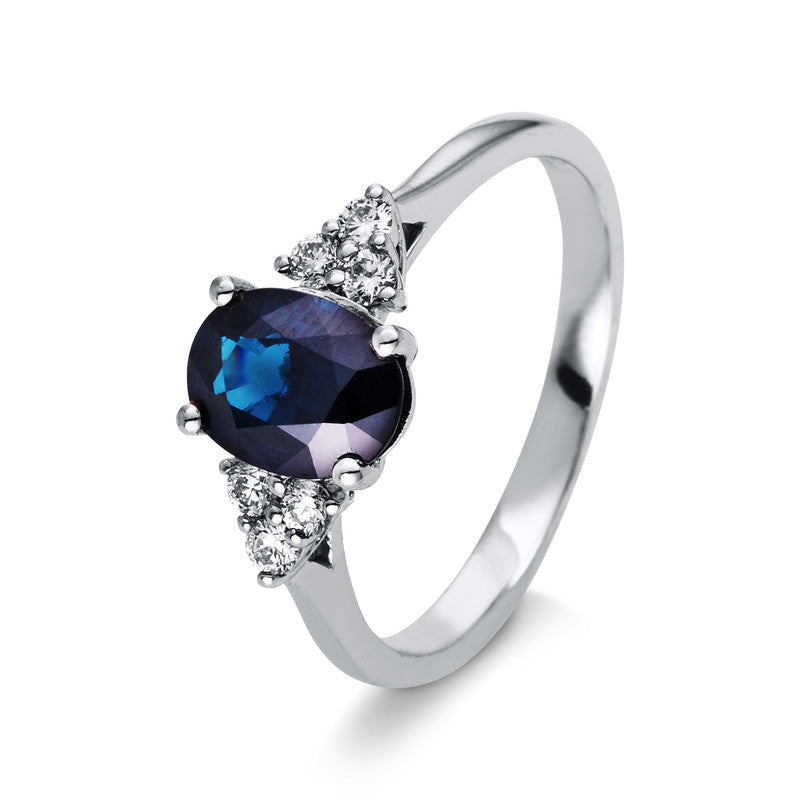 Ring 18 kt WG, 6 Brill. 0,16 ct, TW-si, 1 Saphir 1,45 ct blau