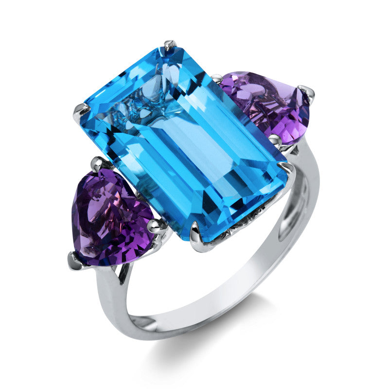 Ring 18 kt WG, 1 Blautopas 10,50 ct blau, 2 Amethyste 2,60 ct lila