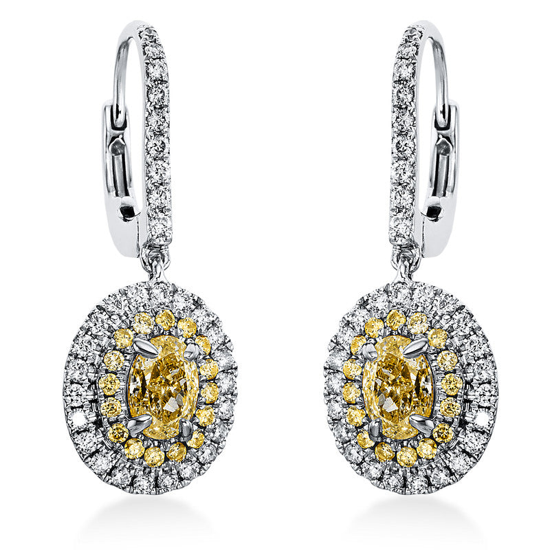 Ohrschmuck 18 kt WG+GG, 62 Brill. 0,42 ct, TW-si, 2 Oval 1,05 ct, gelb, 32 Brill. 0,22 ct, gelb