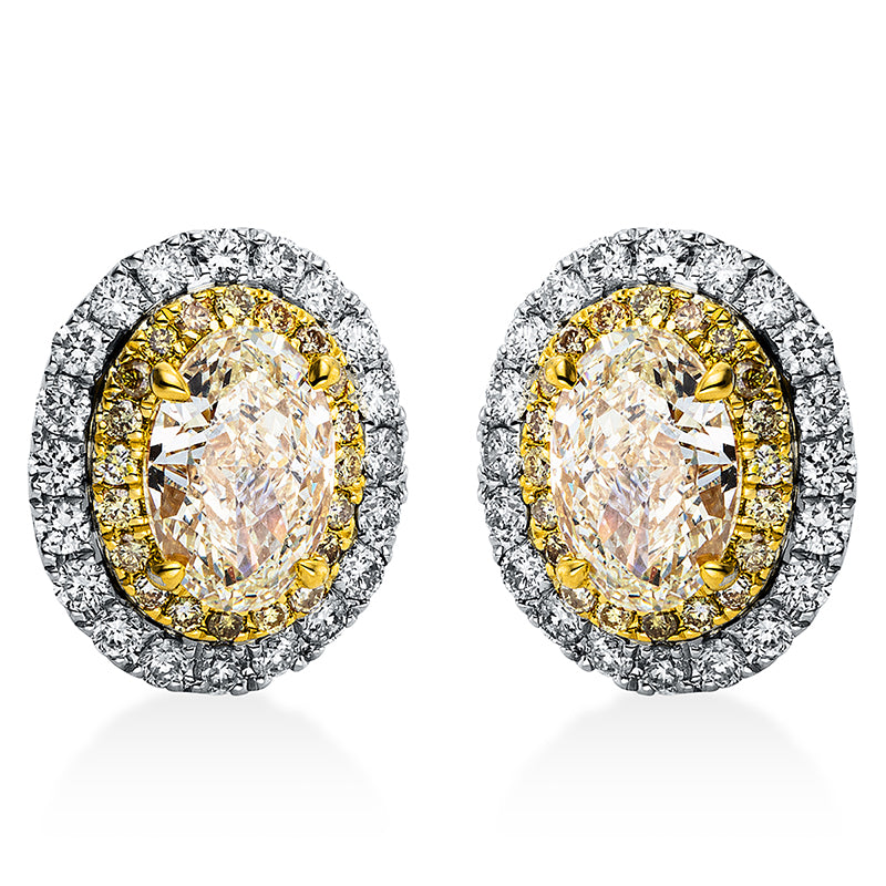Ohrstecker 18 kt WG+GG, 40 Brill. 0,48 ct, TW-si, 2 Oval 2,02 ct, gelb, 40 Brill. 0,21 ct, gelb