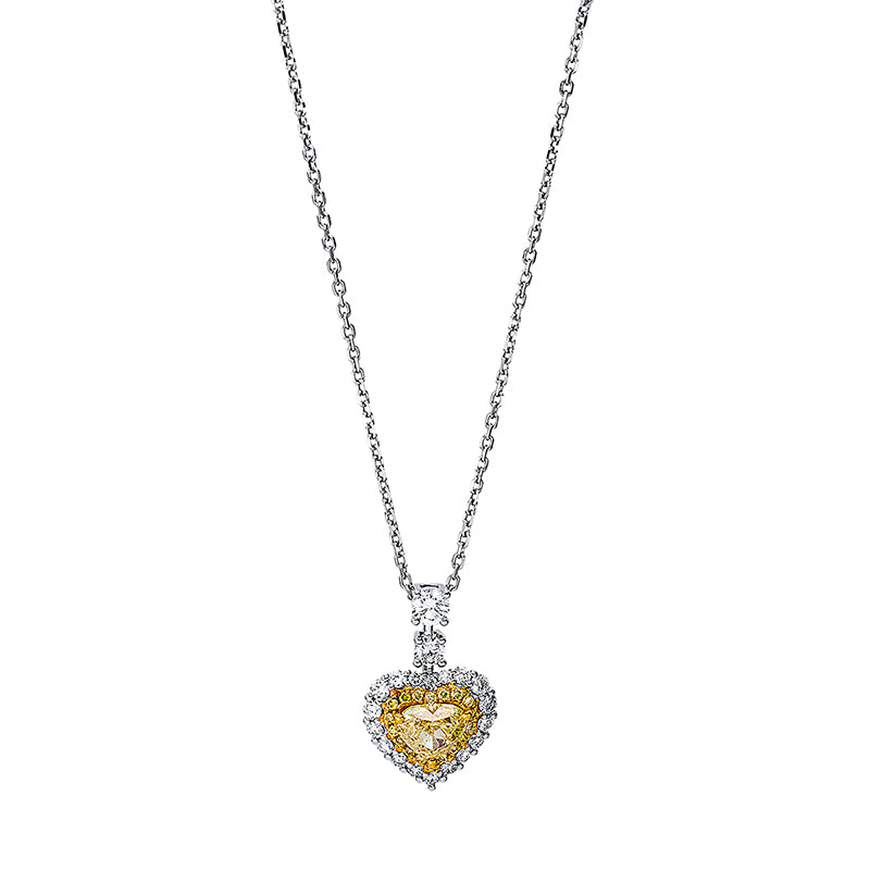 Collier 18 kt WG+GG, 2 Brill. 0,18 ct,18 Brill. 0,24 ct, TW-si, 1 Herzschl. 0,68 ct, 18 Brill. 0,08 ct, gelb