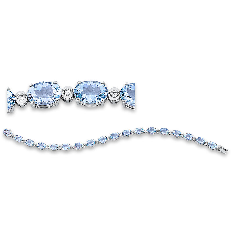 Armband 18 kt WG, 18 Brill. 0,48 ct, TW-si, 18 Aquamarin 12,10 ct blau