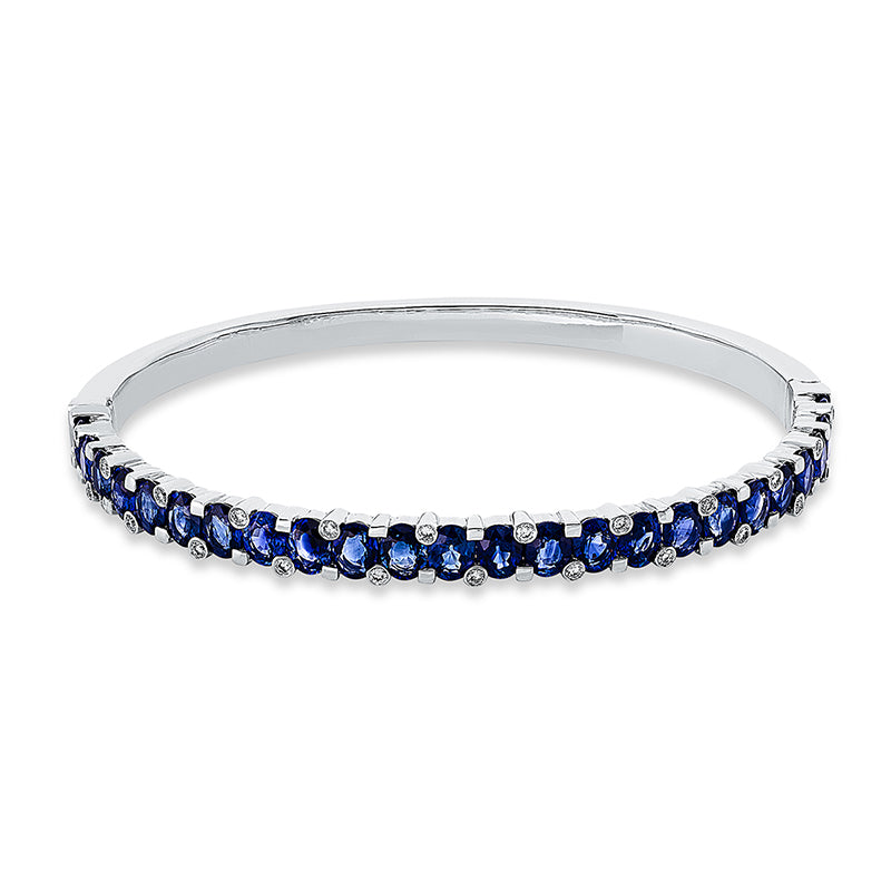 Armreif 18 kt WG, 25 Brill. 0,27 ct, TW-vsi/si, 24 Saphire 7,73 ct blau