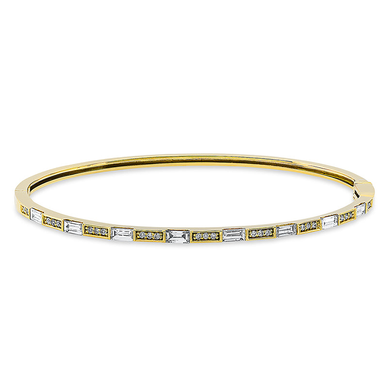 Armreif 18 kt GG, 8 Bag. 0,71 ct, TW-si, 25 Brill. 0,12 ct, TW-si