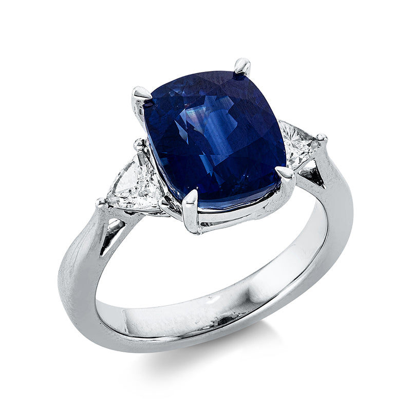 Ring 4er-Krappe 18 kt WG. 2 Tri.Sond. 0.49 ct. TW-si. 1 Saphir 6.49 ct blau. H:8.9 mm. B:10.8 mm. Weite:54