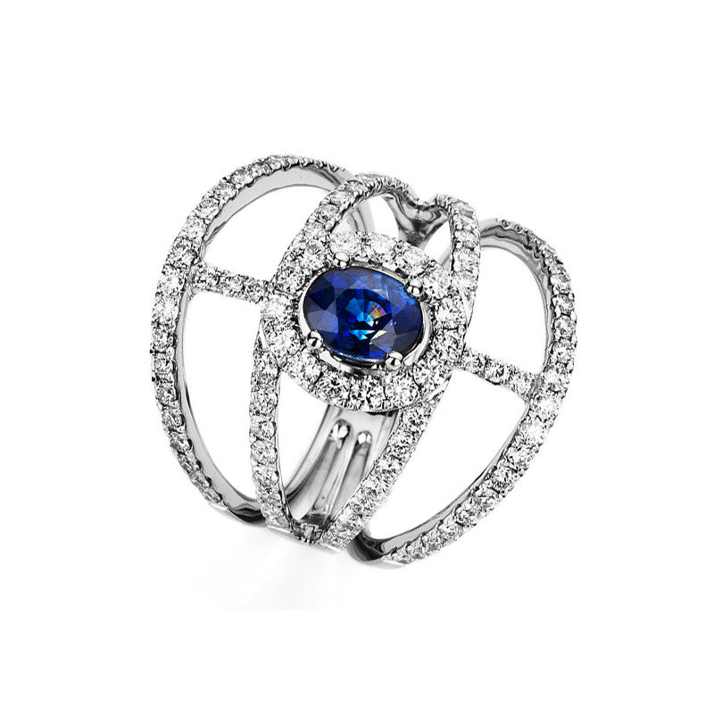 Ring 18 kt WG, 93 Brill. 1,34 ct, TW-vsi/si, 1 Saphir 1,27 ct blau