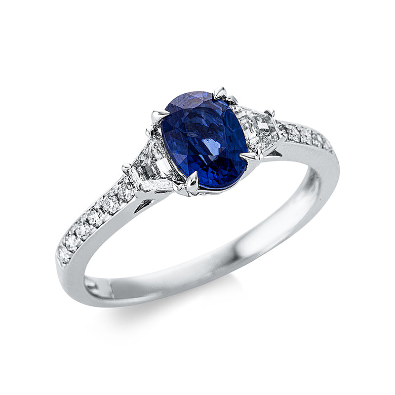 Ring 18 kt WG, 2 Trap. 0,23 ct, W-si, 12 Brill. 0,12 ct, W-si, 1 Saphir 1,13 ct blau