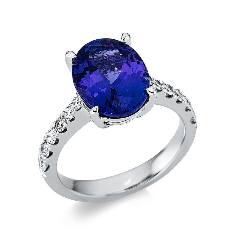 Ring 4er-Krappe 14 kt WG. 12 Brillanten 0.51 ct. TW-si. 1 Tansanit 5.01 ct blau. H:9.4 mm. B:12.5 mm. Weite:54