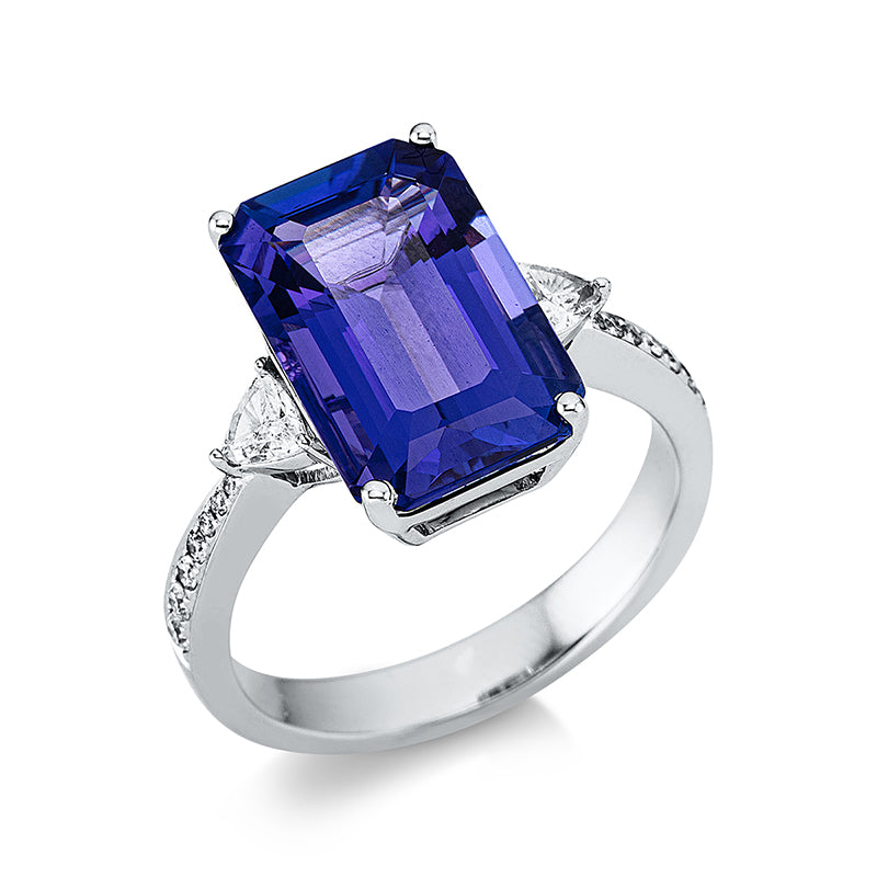 Ring 4er-Krappe 18 kt WG. 14 Brillanten 0.13 ct. TW-si. 1 Tansanit 6.88 ct blau. 2 Tansanit 0.29 ct blau. Weite:55
