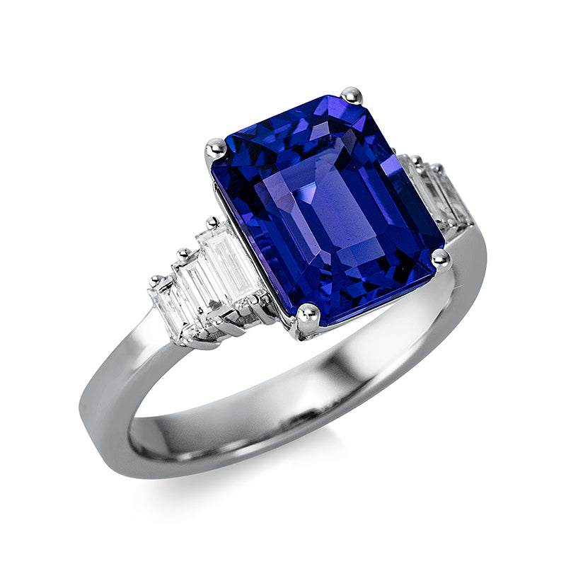 Ring 4er-Krappe 18 kt WG. 6 Baguette 0.37 ct. TW-si. 1 Tansanit 4.38 ct blau. H:15.6 mm. B:10.3 mm. S:7.0 mm. Weite:54