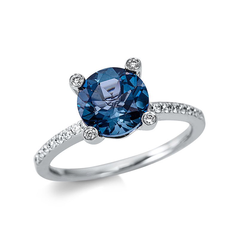 Ring 18 kt WG, 4 Brill. 0,03 ct, TW-si, 32 Brill. 0,19 ct, TW-si, 1 Topas 2,37 ct Lond. blue