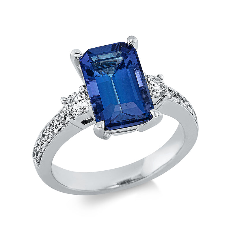 Ring 4er-Krappe 18 kt WG. 12 Brillanten 0.57 ct. TW-si. 1 Tansanit 4.25 ct blau. H:12.8 mm. B:12.6 mm. Weite:54