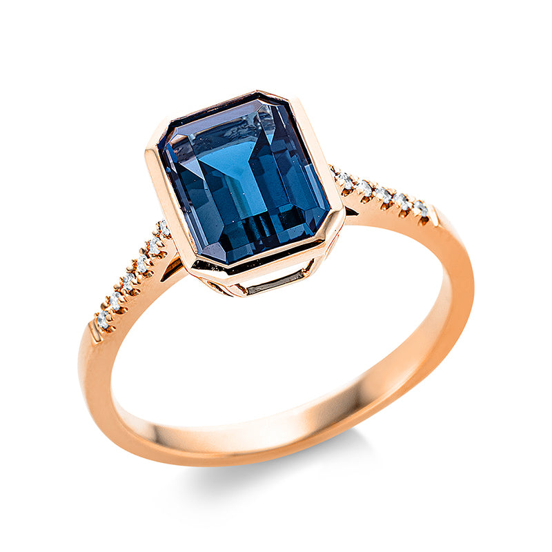 Ring 18 kt RG. 12 Brillanten 0.05 ct. TW-si. 1 Topas 2.60 ct Lond. blue. H:7.9 mm. B:9.8 mm. Weite:54