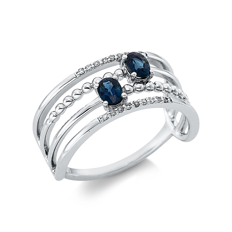 Ring 18 kt WG. 18 Diamanten 0.06 ct. W-si. 2 Saphire 0.46 ct blau. B:8.8 mm. Weite:54