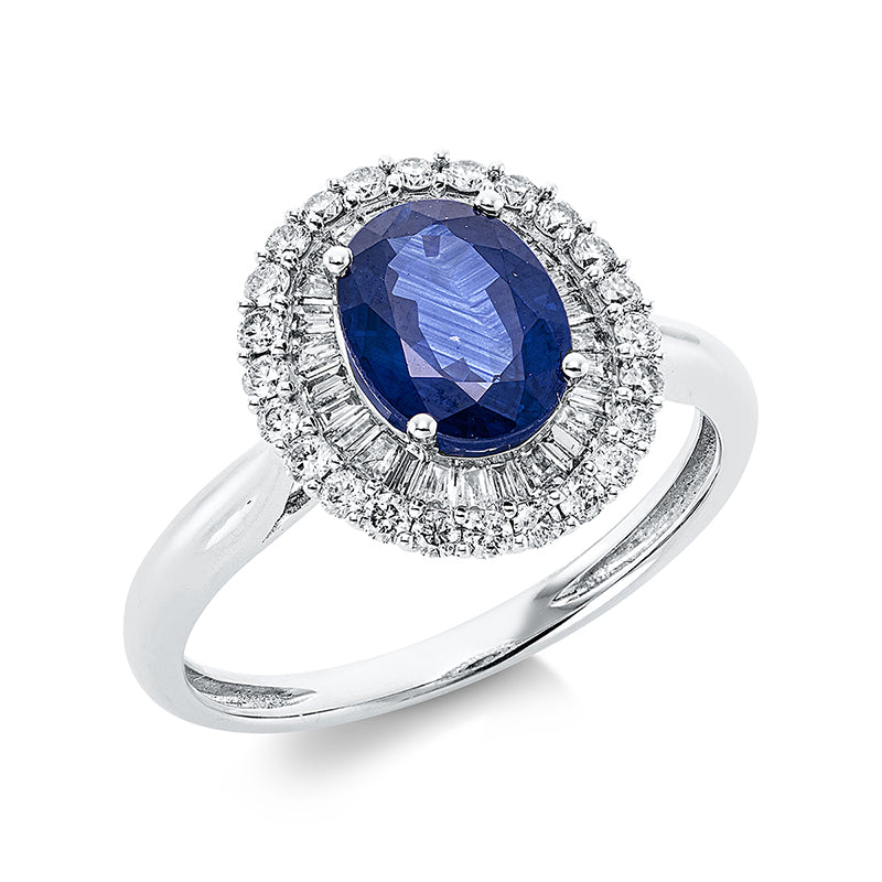 Ring 4er-Krappe 18 kt WG. 27 Trapeze 0.27 ct. TW-si. 24 Brillanten 0.30 ct. TW-si. 1 Saphir 1.63 ct blau. H:12.0 mm. B:13.3 mm. Weite:54