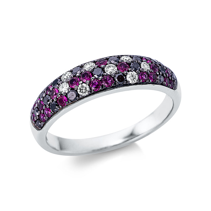 Ring 18 kt WG. teils schwarz rhodiniert. 18 Brillanten 0.24 ct. schwarz. 8 Brillanten 0.15 ct. TW-si. 3 Rubine 0.05 ct rot. 20 Rubine 0.26 ct rot. Weite:54