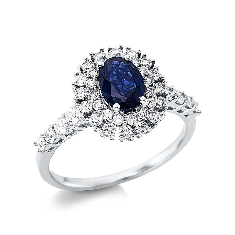 Ring 4er-Krappe 18 kt WG. 6 Brillanten 0.25 ct. TW-si. 34 Brillanten 0.40 ct. TW-si. 1 Saphir 0.95 ct blau. Weite:54