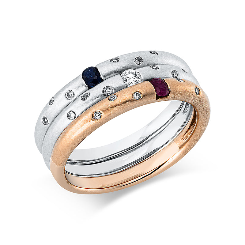 Ring 14 kt RG+WG. 1 Brill. 0.06 ct. TW-si. 18 Diamanten 0.09 ct. TW-si. 1 Saphir 0.06 ct blau. 1 Rubin 0.06 ct rot. B:7.7 mm. Weite:53