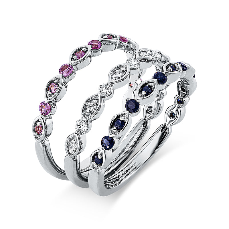 Ring 18 kt WG. 13 Brillanten 0.19 ct. TW-si. 13 Saphire 0.28 ct pink. 13 Saphire 0.24 ct blau. B:7.0 mm. Weite:54