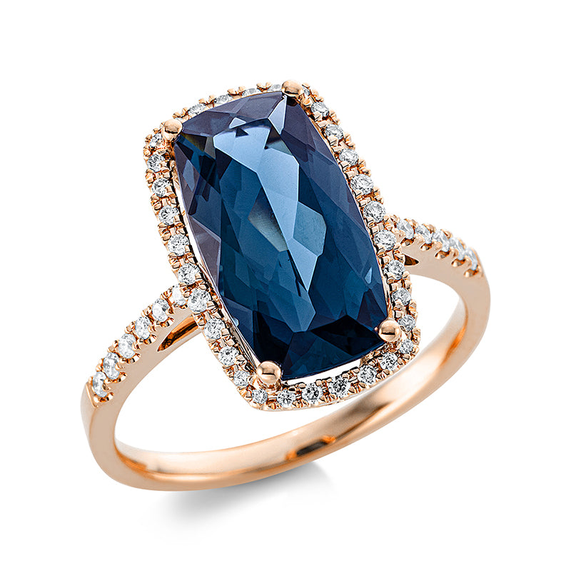Ring 4er-Krappe 18 kt RG. 44 Brillanten 0.21 ct. TW-si. 1 Topas 5.30 ct Lond. blue. H:9.8 mm. B:16.0 mm. Weite:54