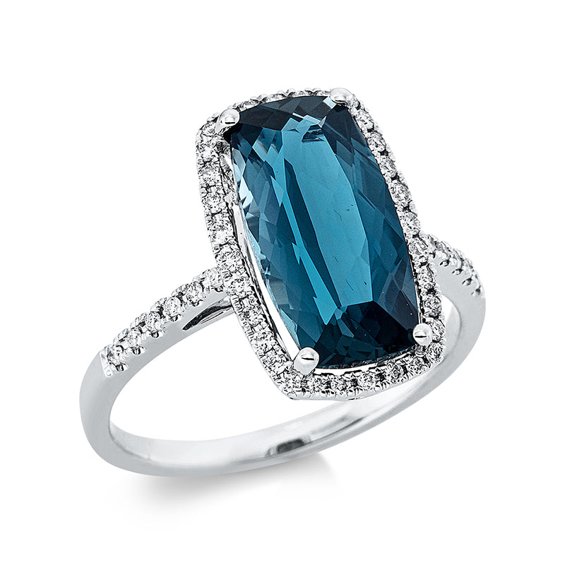Ring 18 kt WG, 44 Brill. 0,24 ct, TW-si, 1 Topas 4,50 ct Lond. blue