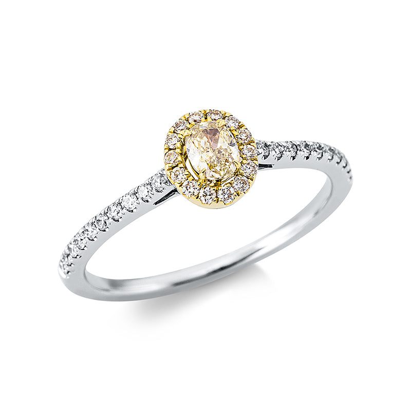 Ring 18 kt WG+GG. 20 Brillanten 0.12 ct. TW-si. 1 Oval 0.19 ct. gelb. 14 Brillanten 0.08 ct. gelb. H:5.8 mm. B:6.4 mm. Weite:52