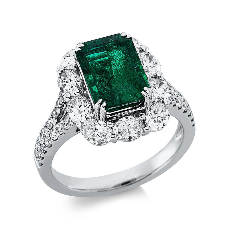 Ring 18 kt WG. 10 Brillanten 1.36 ct. TW-si. 32 Brillanten 0.29 ct. TW-si. 1 Smaragd 2.95 ct grün. Weite:53