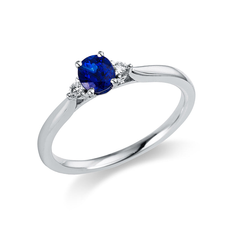Ring 18 kt WG, 2 Brill. 0,08 ct, TW-si, 1 Saphir 0,60 ct blau
