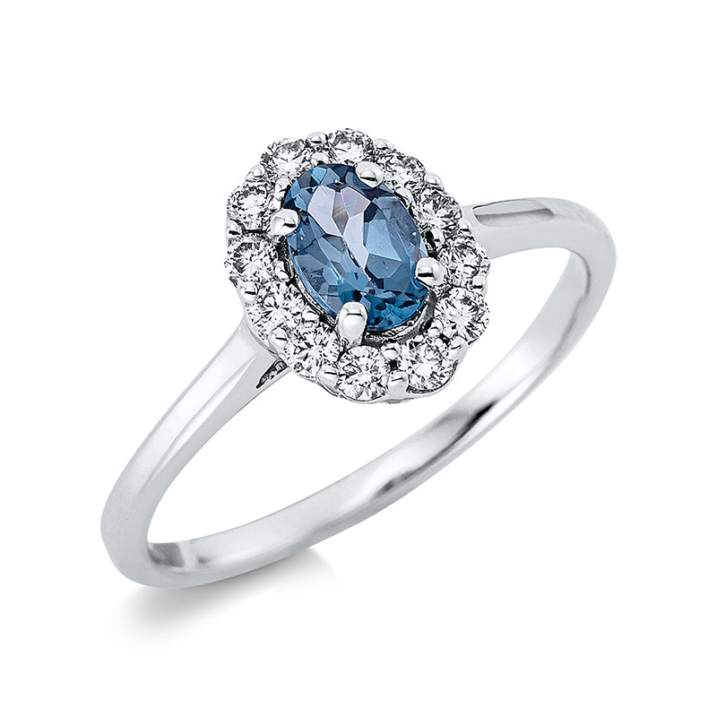 Ring 18 kt WG, 6 Brill. 0,11 ct, TW-si, 4 Brill. 0,10 ct, TW-si, 2 Brill. 0,04 ct, TW-si, 1 Topas 0,58 ct Lond. blue
