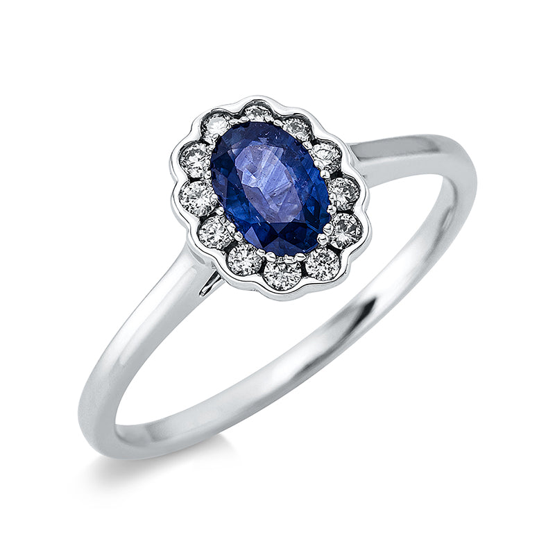 Ring 18 kt WG, 12 Brill. 0,15 ct, TW-si, 1 Saphir 0,55 ct blau