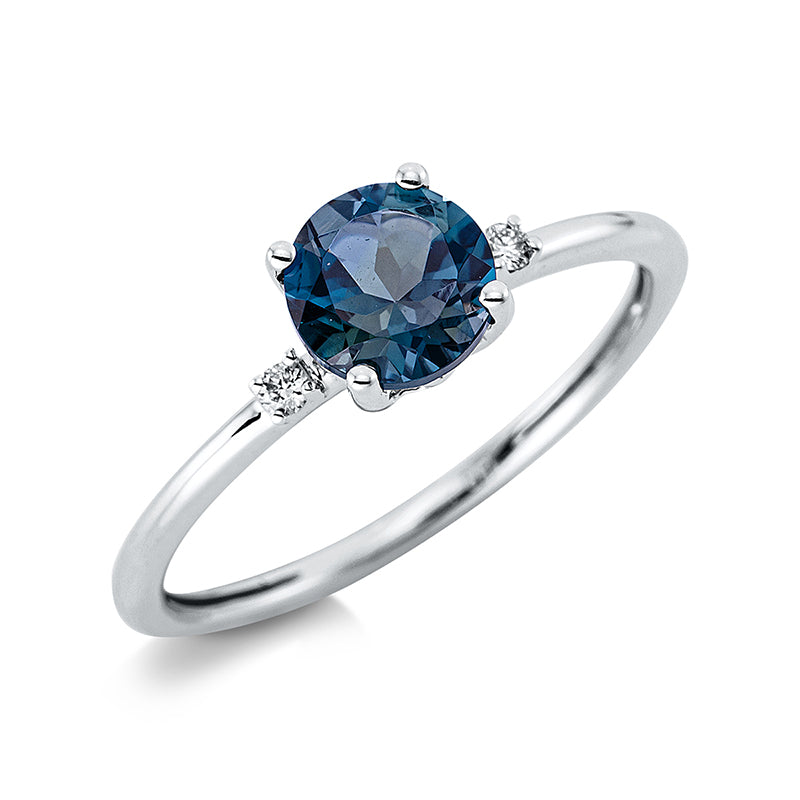 Ring 18 kt WG, 2 Brill. 0,03 ct, TW-si, 1 Topas 1,00 ct Lond. blue