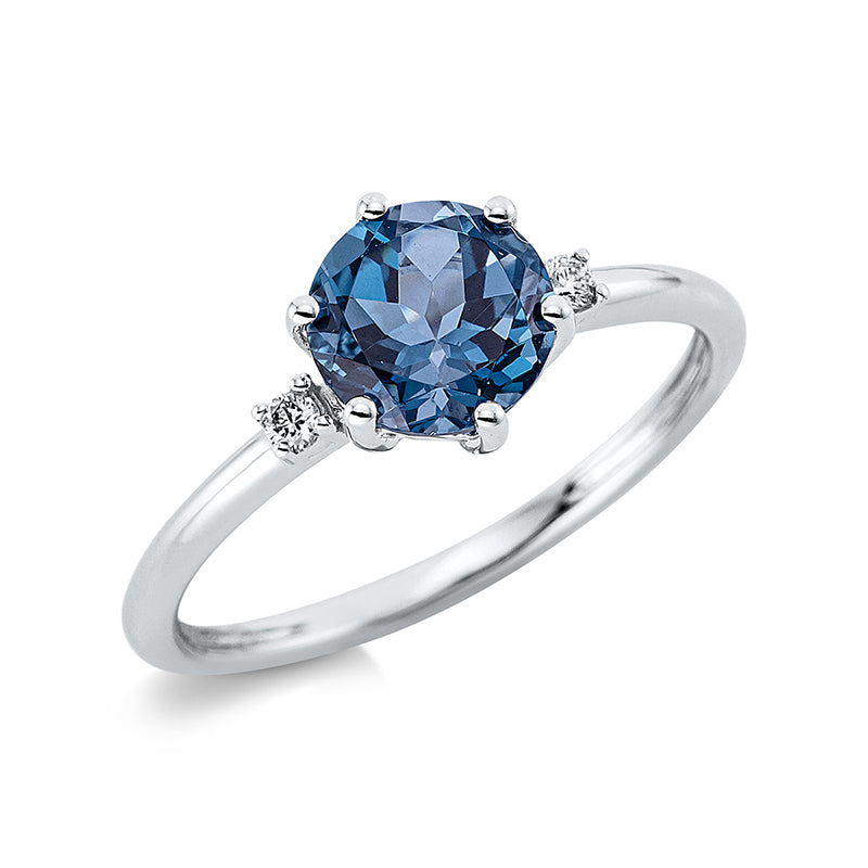 Ring 18 kt WG, 2 Brill. 0,04 ct, TW-si, 1 Topas 1,50 ct Lond. blue