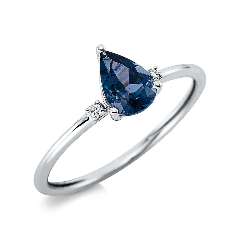Ring 18 kt WG, 2 Brill. 0,02 ct, TW-si, 1 Topas 0,85 ct Lond. blue