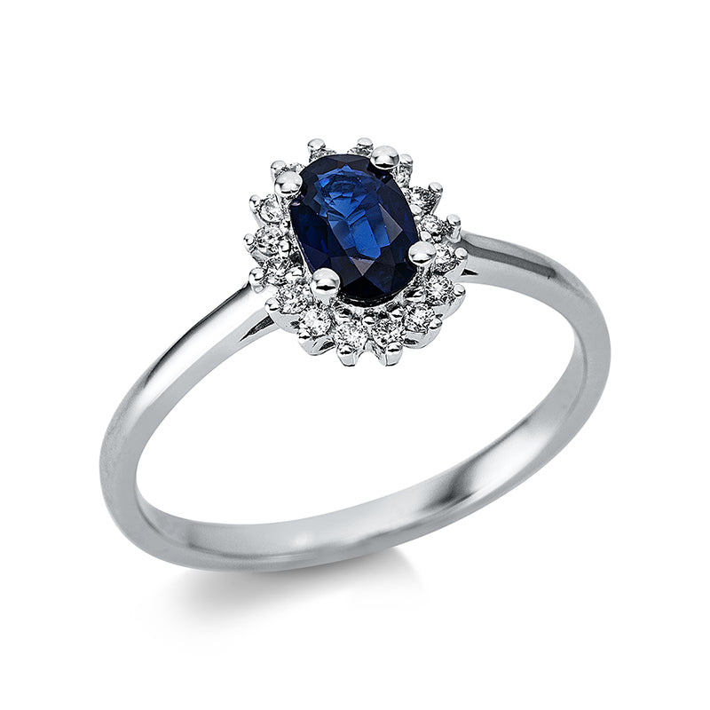Ring 4er-Krappe 18 kt WG. 16 Brillanten 0.10 ct. TW-si. 1 Saphir 0.57 ct blau. H:7.8 mm. B:9.4 mm. S:4.5 mm. Weite:54