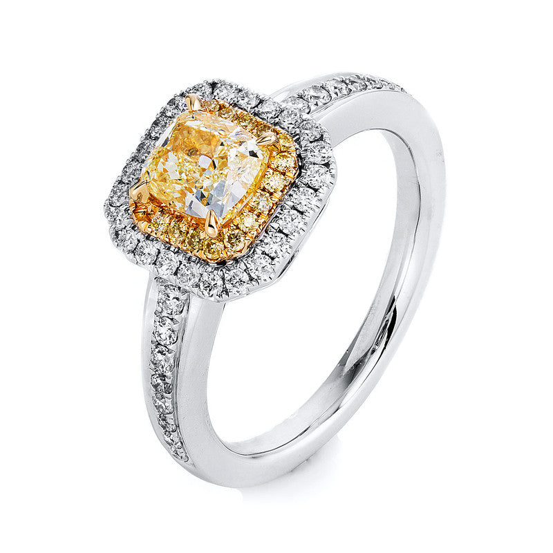 Ring 4er-Krappe 18 kt WG+GG. 40 Brillanten 0.32 ct. TW-si. 1 Cushion 1.11 ct. gelb. 20 Brillanten 0.09 ct. gelb. Weite:54