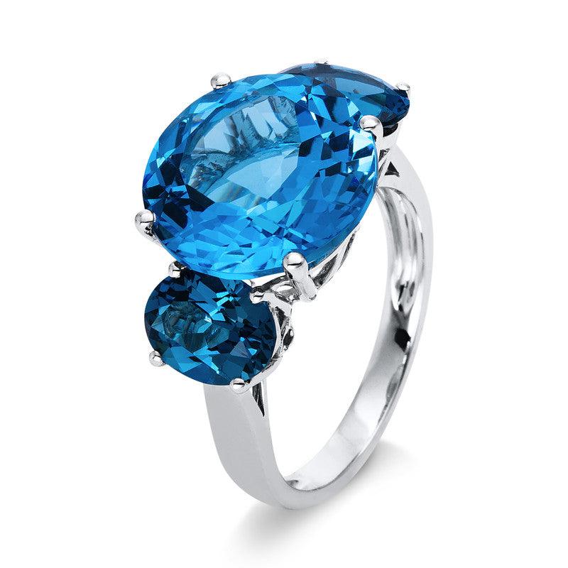 Ring 18 kt WG, 2 Blautopase 2,80 ct Lond. blue, 1 Blautopas 9,60 ct blau