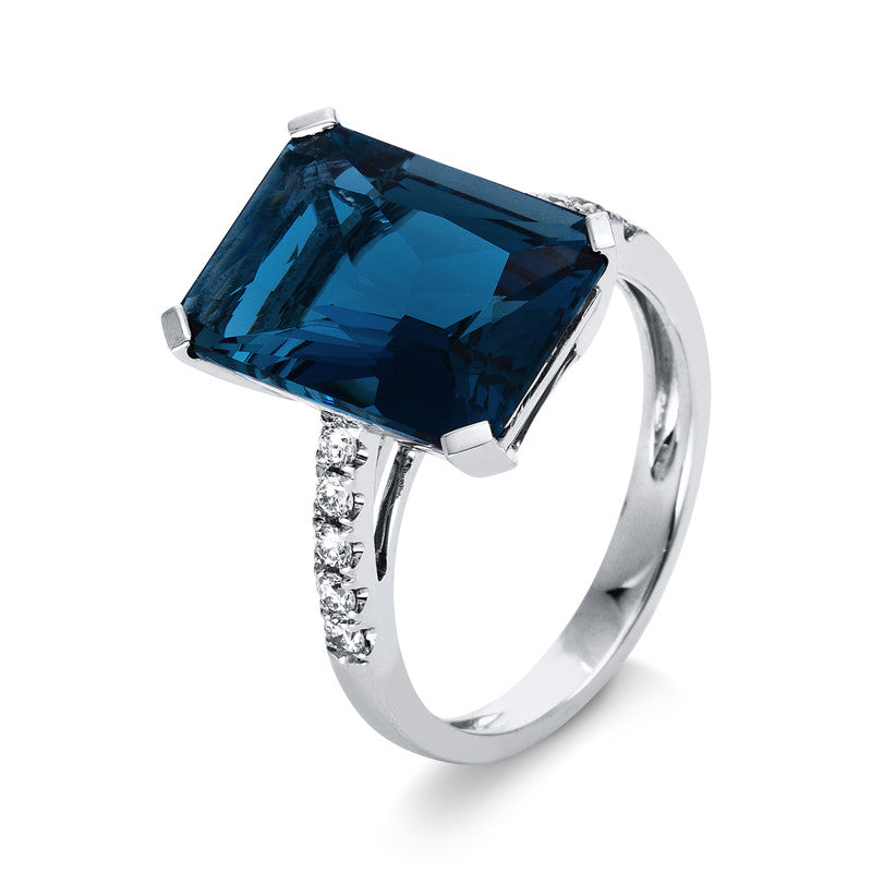 Ring 18 kt WG, 10 Brill. 0,23 ct, TW-si, 1 Blautopas 9,30 ct Lond. blue