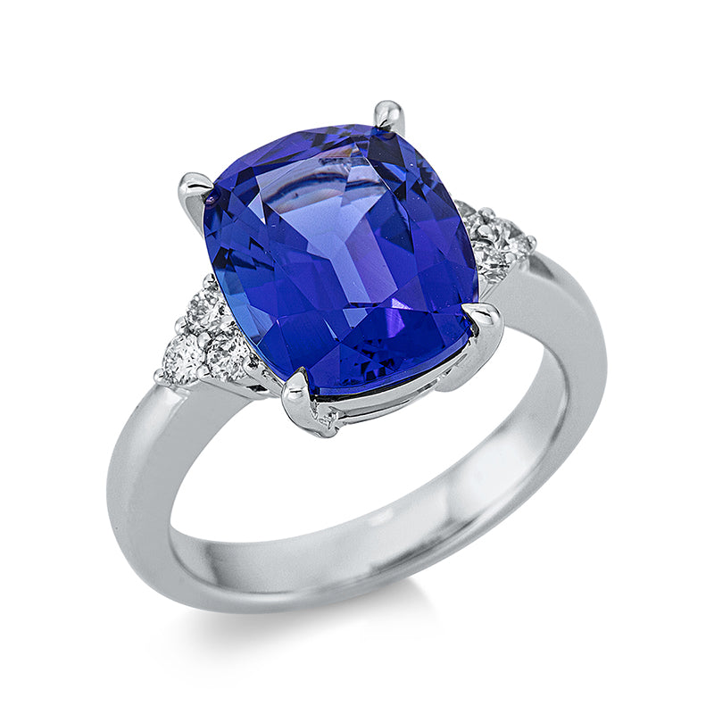 Ring 18 kt WG, 6 Brill. 0,24 ct, TW-si, 1 Tansanit 6,12 ct blau